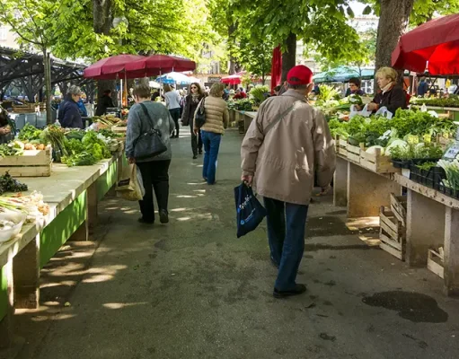7 Insanely Fun Ways to Learn a Language While Traveling locals at a farmers market