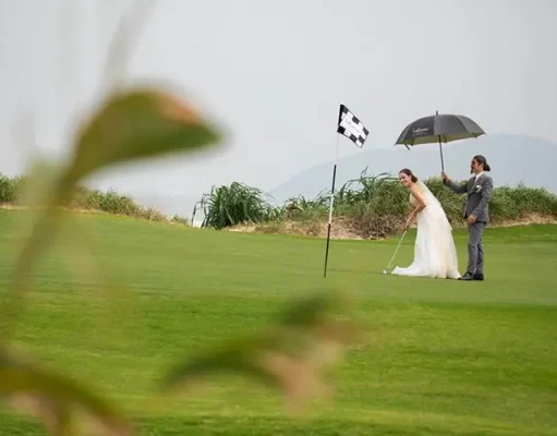 Laguna Golf Lang Co Tees Up On-Course Weddings couple playing golf at their wedding
