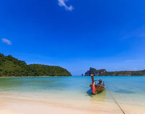 Discover the Exotic Allure of Asia: Unveiling the Ultimate Cruise Experience Long tailed boat Ruea Hang Yao in Phi Phi island Thailand