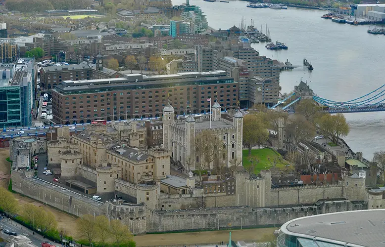 Views from the Sky Garden at the Tower of London and the Tower bridge crossing over the River Thames.