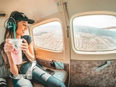 Top Tips to Help You Find the Right Tour for Your Next Holiday woman in blue denim jeans and black hat sitting on seat in a small aircraft