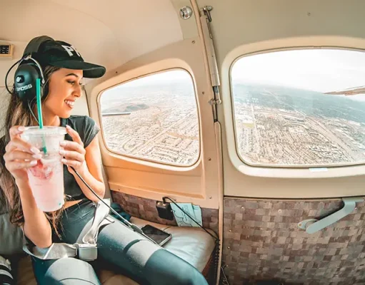 Top Tips to Help You Find the Right Tour for Your Next Holiday woman in blue denim jeans and black hat sitting on seat in a small aircraft