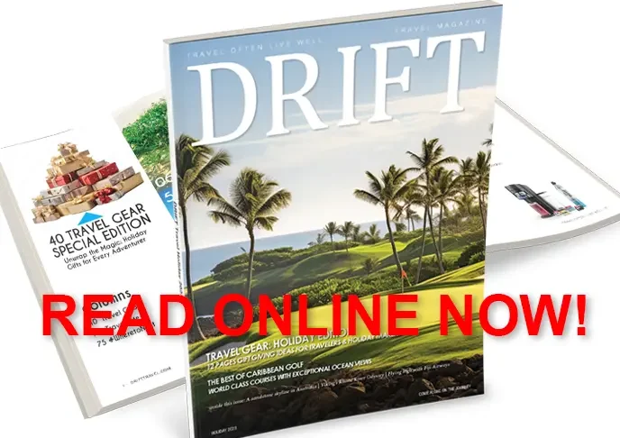 DRIFT Travel Magazine with a beautiful tropical golf course on the cover under a clear blue sky.