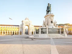 Lisbon voted Best Urban Destination in Europe Morning view on the Commerce square with statue fo king Joseph and Triumphal arch in Lisbon city, Portugal
