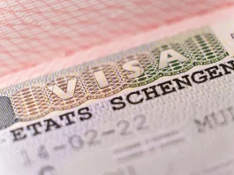 Macro shot biometric passport with schengen visa. European visitor visa for tourism and travel in EU