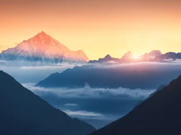 Mountains and low clouds at sunrise in Nepal