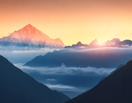 Wellness in the Himalayas: Upcoming Himalayan Resort & Spa Mountains and low clouds at sunrise in Nepal