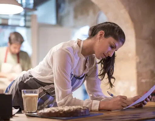 Savoring the World: How Travel Enthusiasts Can Work in Restaurants and Gain Unique Traveling Experiences Restaurant owners working in kitchen