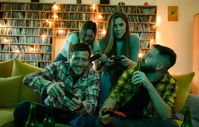A group of friends playing video games while relaxing at home