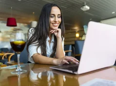 Day Rooms: A Smart Way To Bridge The Gap Between Flights Business woman working in airport lounge