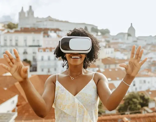 The Game-Changing Technologies Simplifying Travel Happy millennial african american woman in vr glasses in city, enjoy summer travel and online game