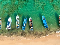 5 destinations in Quintana Roo to enjoy your Holiday Vacation Botes en Puerto Morelos