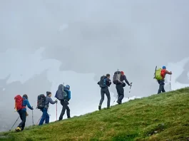 group of travelers climbing the mountain
