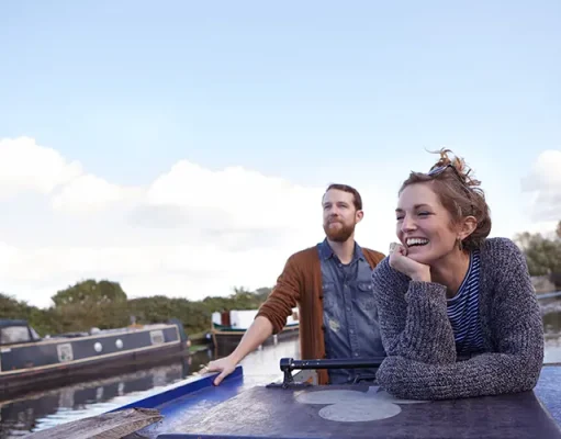 Cruise the UK’s Waterways: Top Autumn Canal Boat Day Trips Couple on canal boat