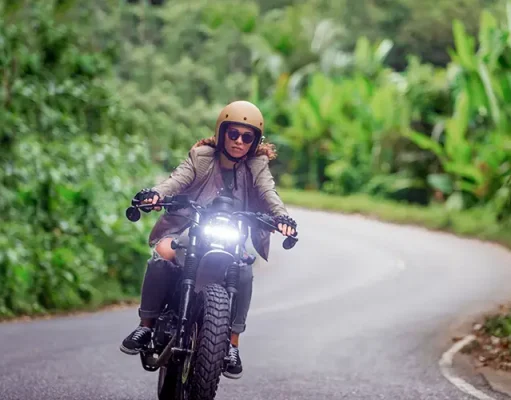 A Complete Guide to Motorcycle Rental in Phuket – Everything You Need to Know Female biker driving a cafe' racer motorbike