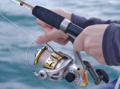 Fishing Adventures on a Yacht Charter in Dubai man fishing with Fishing Adventures on a Yacht Charter in Dubai