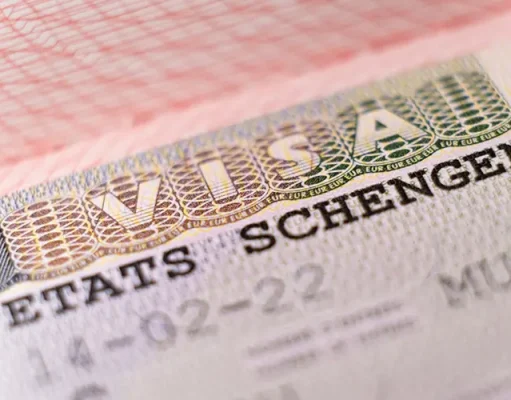 How To Apply For A Switzerland Schengen Visa For Philippine Tourists Macro shot biometric passport with schengen visa.