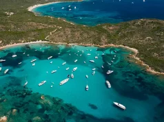 Yacht Life Begins At 40 With New Yacht Week Adventure a group of boats ready for Yacht Week in Sardinia over 40