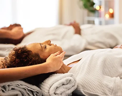 Top Trending Spa Destinations For 2024, Revealed Head massage, couple and spa for zen and relax massage from a massage therapist in a spa