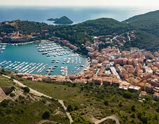 Introducing La Roqqa & Isolotto Beach Club, a spectacular new destination in Porto Ercole arial view of Porto Ercole, Italy