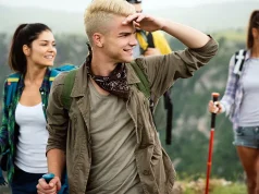 New Study Reveals World’s “Happiest” Walks Group of friends hiking together outdoors exploring the wilderness and having fun