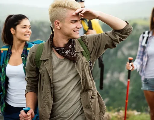 How to Prepare for Your Hiking Vacation Group of friends hiking together outdoors exploring the wilderness and having fun