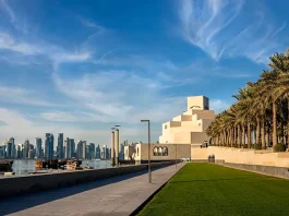 Seafront of Doha skyline and Museum of Islamic Art view during sunny day Doha, Qatar