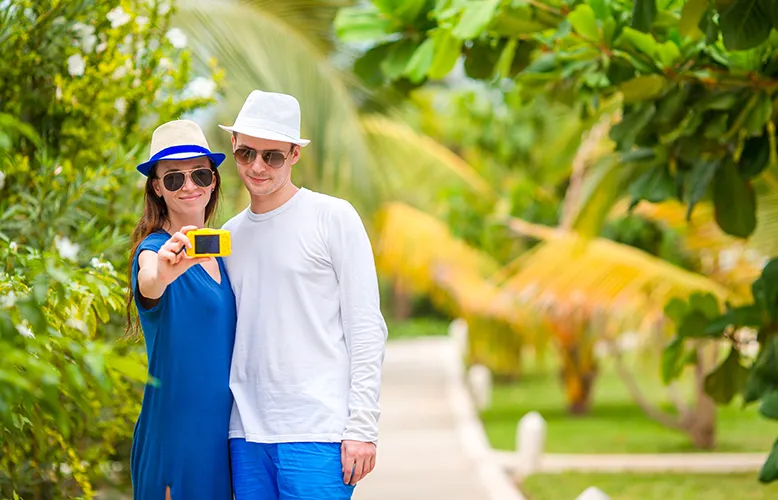 young-happy-couple-making-selfie-with-mobile-phone-2023-11-27-05-12-43-utc copy