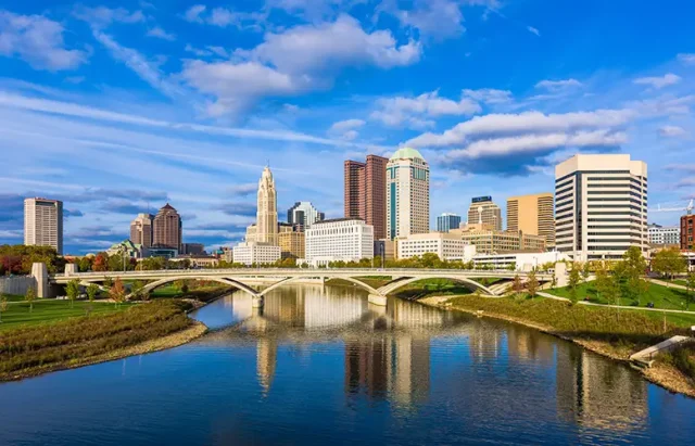 Columbus, Ohio, USA downtown skyline over the Scioto River.