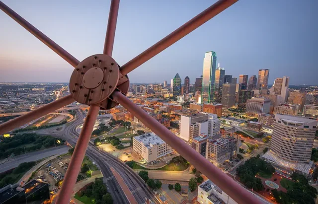 Dallas, Texas, USA downtown skyline at dusk viewed from above.