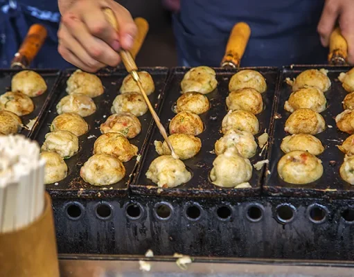 Osaka’s Street Food Scene: A Culinary Tour Through Dotonbori and Beyond