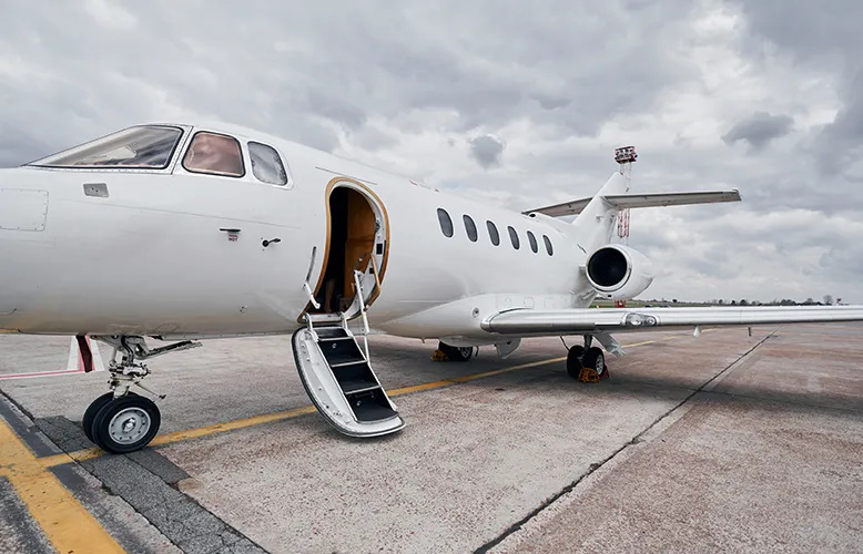 cloudy-weather-turboprop-aircraft-parked-runway-daytime copy