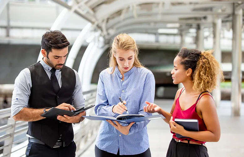 business-people-discussing-while-standing-on-footb-2025-02-03-09-51-03-utc copy