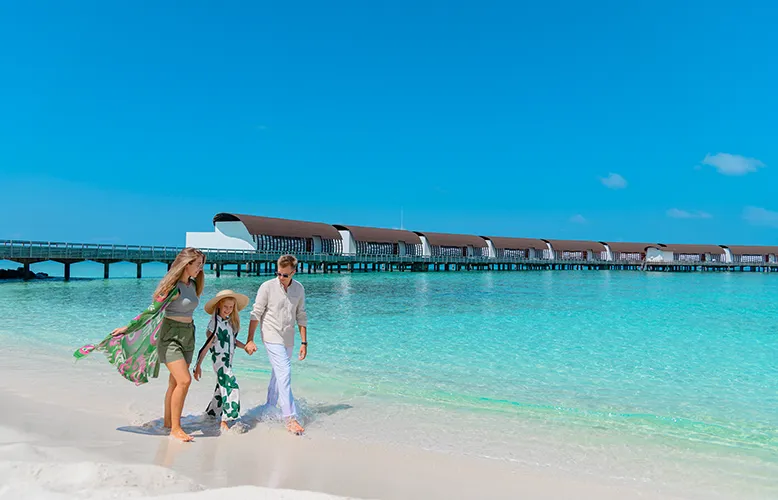TravMedia_USA_1683840_Marriott-International_The_Westin_Maldives_Miriandhoo_Resort_-_Family_at_the_Beach copy