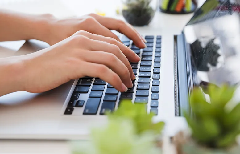close-up-hands-typing-keyboard copy
