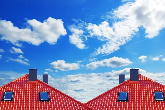 red-roof-with-clouds copy