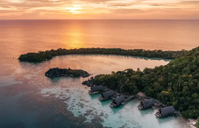 aerial_overwater_suite_sunset_with_setigi_reef_background copy