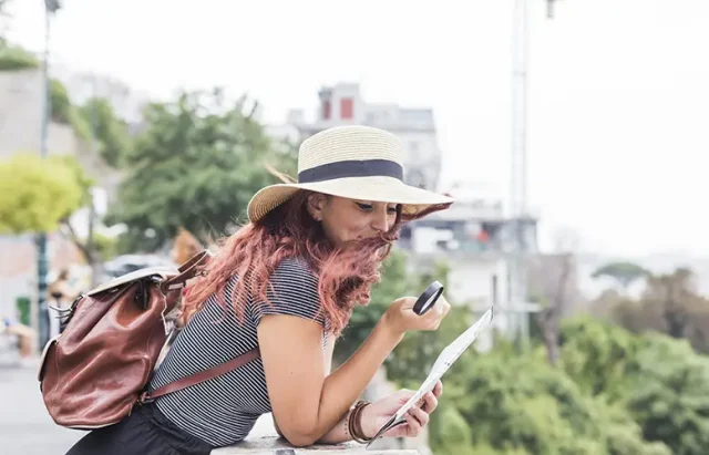 female-tourist-looking-map copy