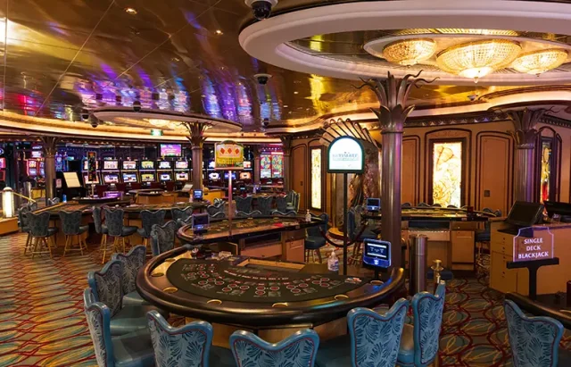 cruise-ship-casino-gambling-blackjack-slot-machines-waiting-tourist-spend-money copy