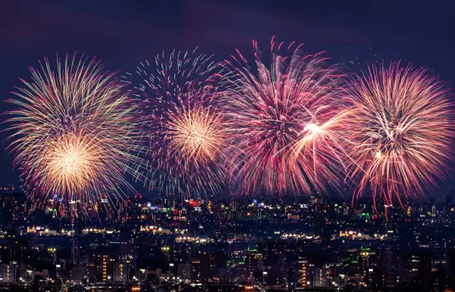 fireworks-over-the-cityscape-at-night-2025-03-13-19-34-16-utc copy