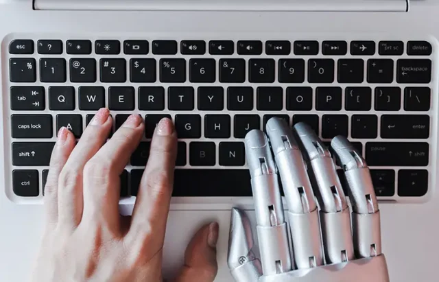 robot-hands-fingers-point-laptop-button-advisor-chatbot-robotic-artificial-intelligence-concept copy