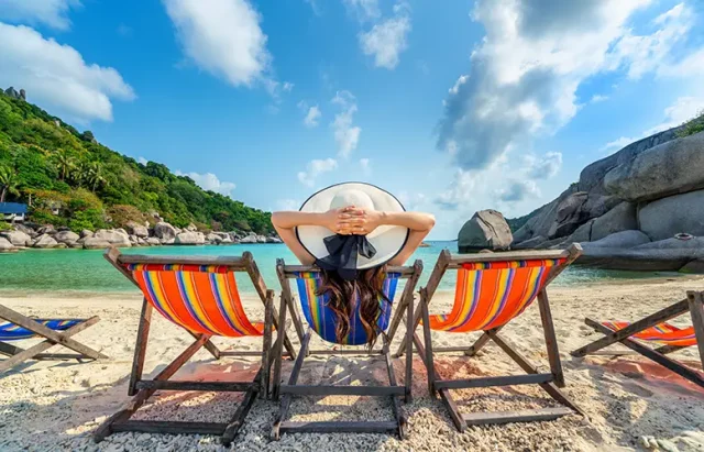 woman-with-hat-sitting-chairs-beach-beautiful-tropical-beach-woman-relaxing-tropical-beach-koh-nangyuan-island copy