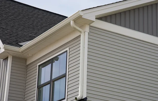 new-installed-gutter-drain-roof-metal-system-pipe copy