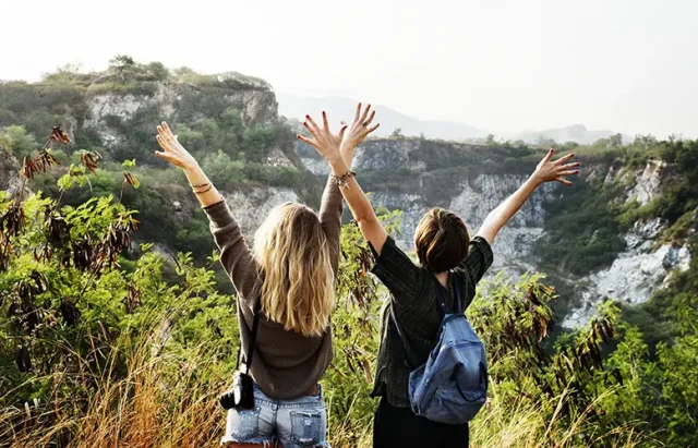 young-women-travel-together-concept copy