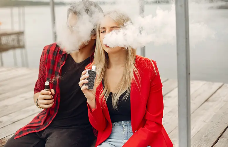 stylish-young-couple-with-vape-city copy