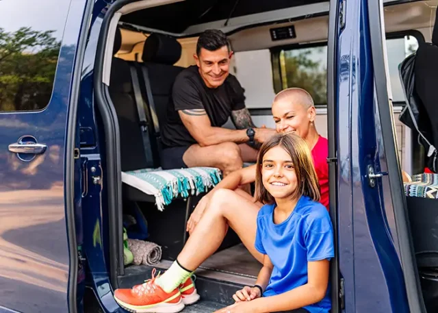 family-resting-van-after-doing-sports-nature copy
