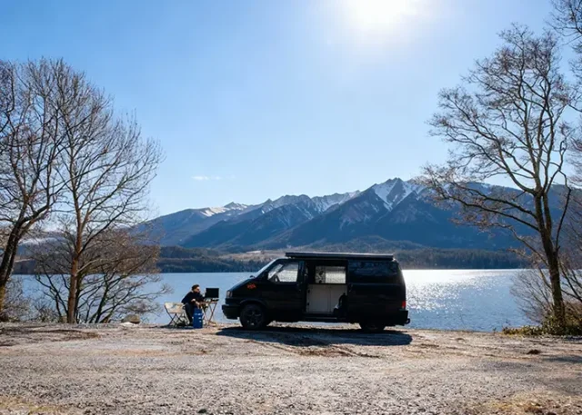 freepik__img1-put-rockey-mountains-in-the-background-on-a-s__38025 copy