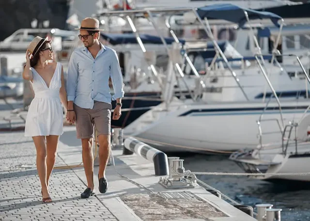 cute-lovely-couple-walking-near-yachts copy