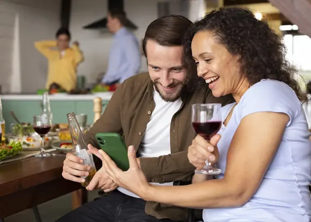 medium-shot-people-with-smartphone copy