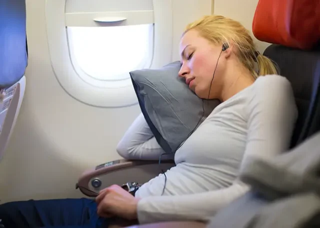 midsection-man-using-mobile-phone-while-sitting-airplane copy